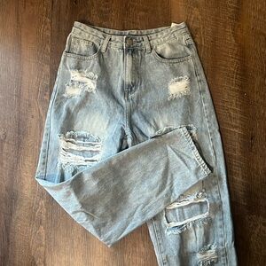 Woman’s Ripped Jeans